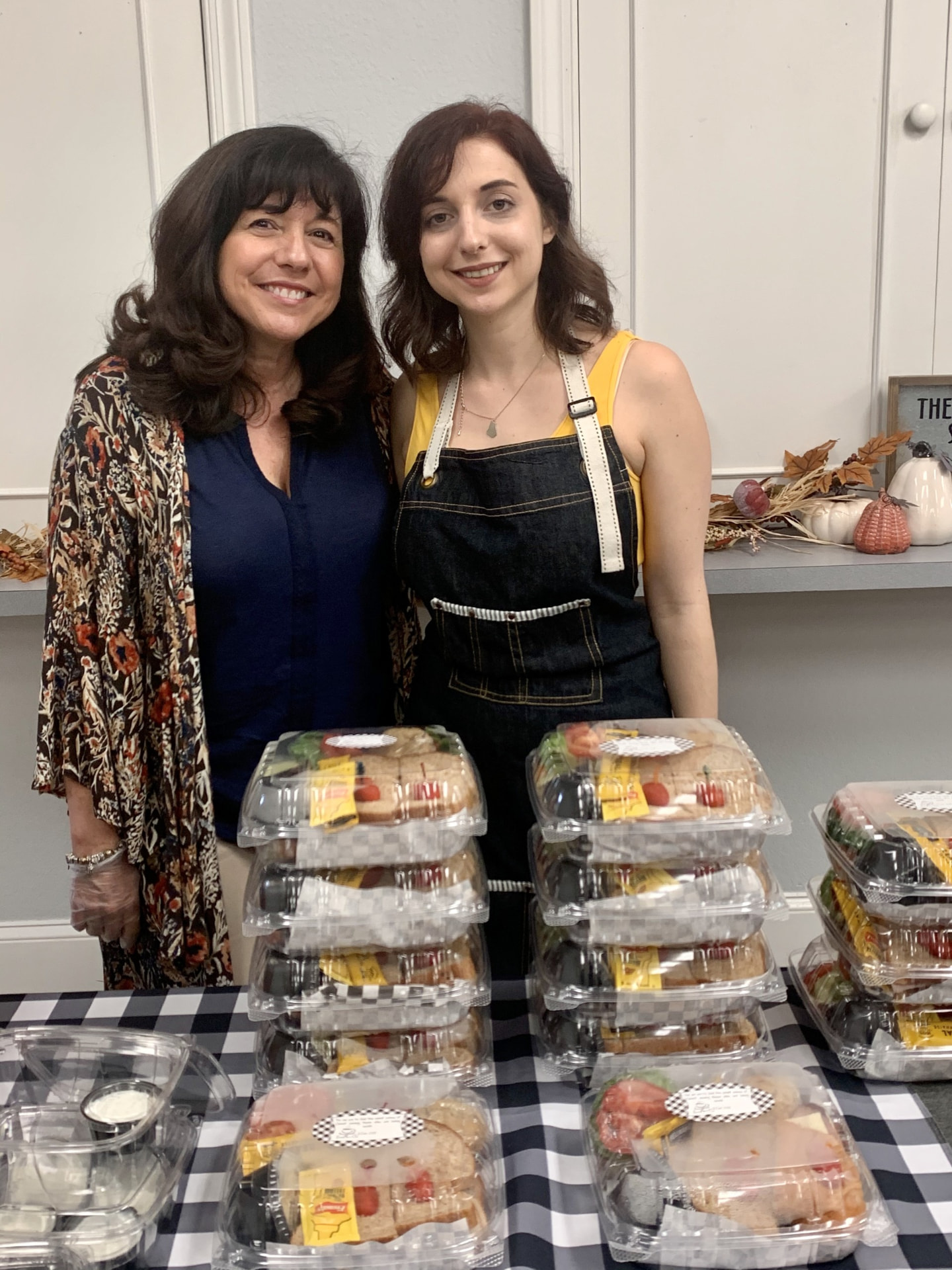 Chef Helen Marie with her daughter June Marie in their kitchen